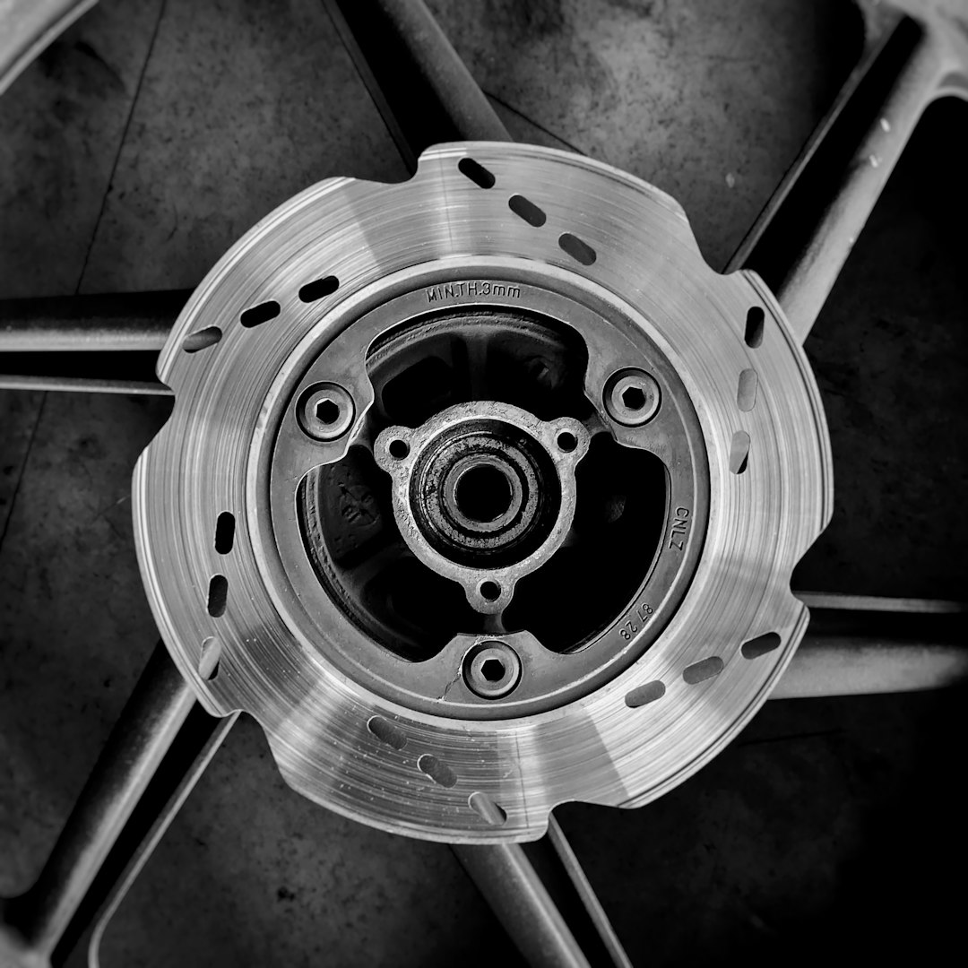 Vehicle wheel and brake system showing brake disc and caliper assembly